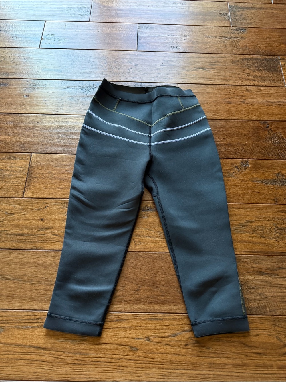 Prana Black wetsuit bottom with Gray and Olive Accent Stripes